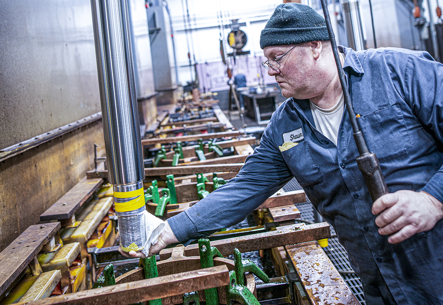 complete employee working on a cylinder