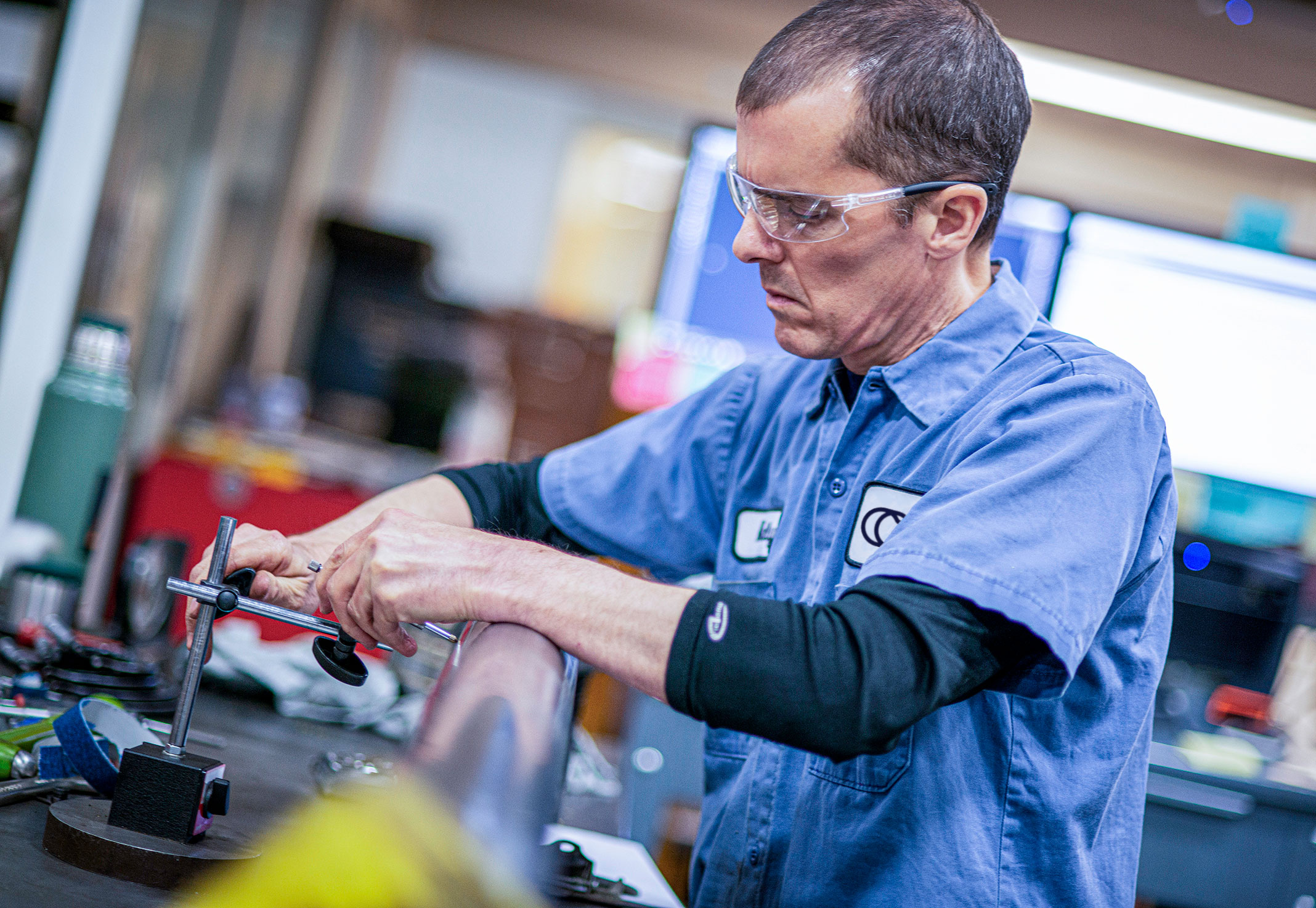 an employee testing a cylinder